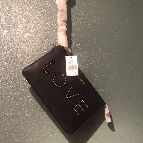 Sold. MK gusset black/gold leather wristlet - Picture 1 of 6